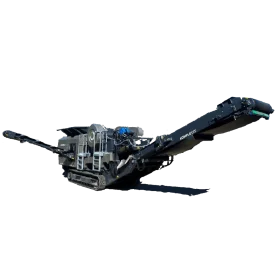 Industrial machinery with conveyors extends from its body, set on tracks.